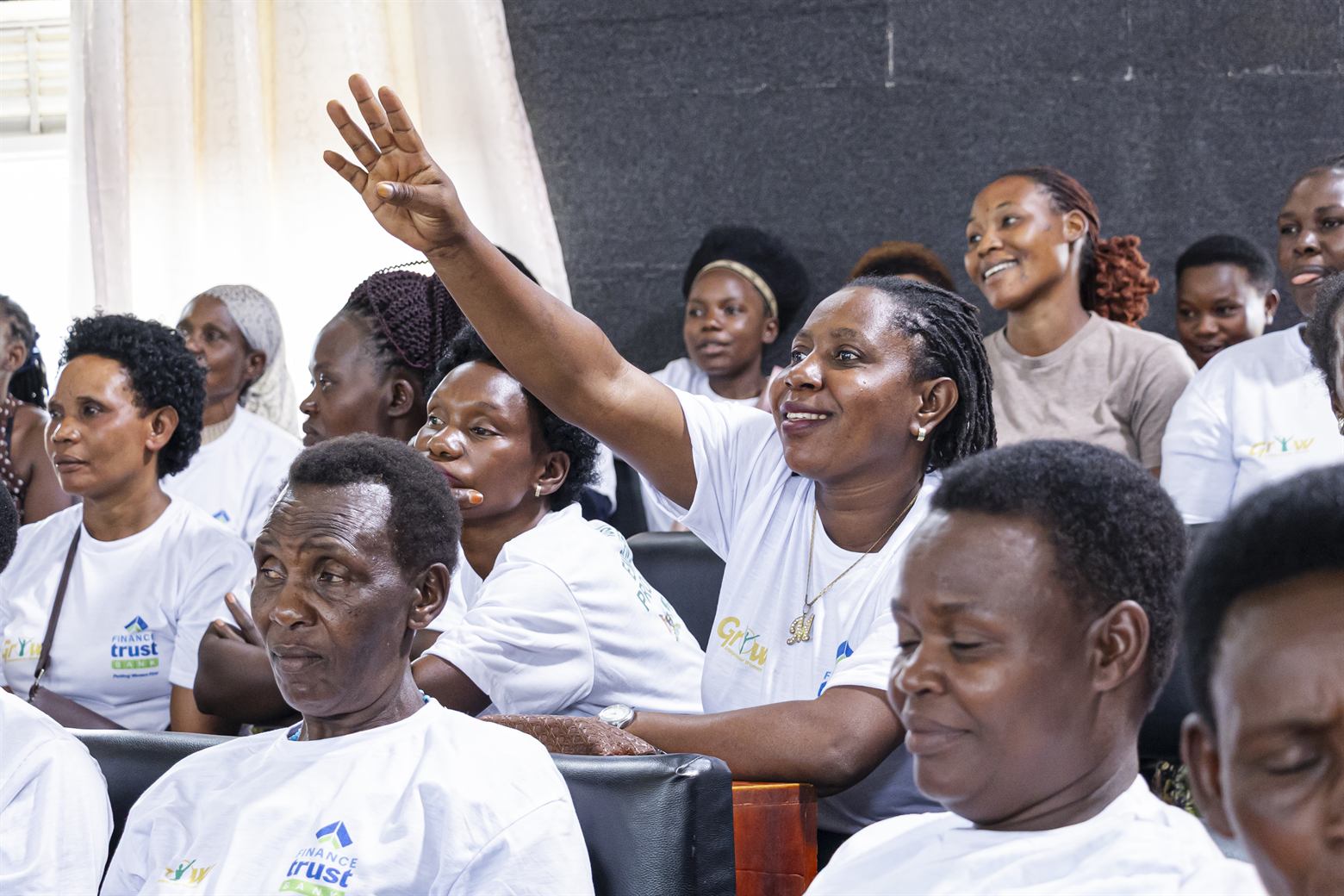 Women entrepreneurs actively engaging with financial literacy specialists during one of the 10-district Trust Empowerment Programme sessions in 2026.